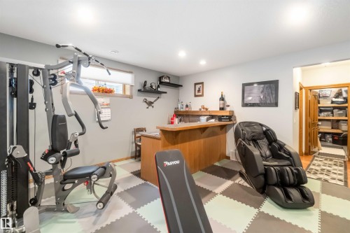 This versatile room features light grey walls and recessed lighting - 61 Linkside Blvd, Spruce Grove, AB - Indoor Photo Showing Gym Room