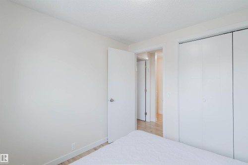 This room features light-colored walls and light-toned flooring, creating a bright and airy atmosphere - 18088 93 Avenue Nw, Edmonton, AB - Indoor Photo Showing Bedroom
