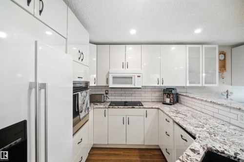 4632 151 Street Nw, Edmonton, AB - Indoor Photo Showing Kitchen With Double Sink With Upgraded Kitchen