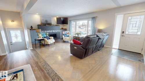 10655 52 Street, Edmonton, AB - Indoor Photo Showing Living Room With Fireplace