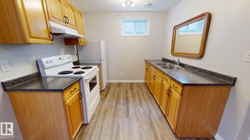 10655 52 Street, Edmonton, AB - Indoor Photo Showing Kitchen With Double Sink