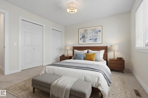 The property features light-colored walls and carpeting, offering a neutral palette - 9 10909 106 Street, Edmonton, AB - Indoor Photo Showing Bedroom
