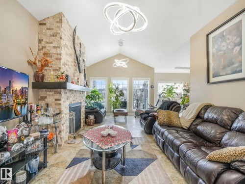 876 Hodgins Road, Edmonton, AB - Indoor Photo Showing Living Room With Fireplace