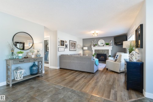 462 Ormsby Road W, Edmonton, AB - Indoor Photo Showing Living Room With Fireplace