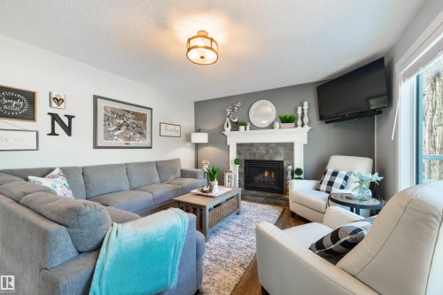 462 Ormsby Road W, Edmonton, AB - Indoor Photo Showing Living Room With Fireplace