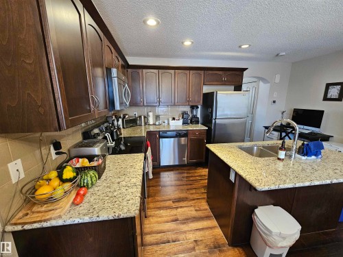 2911 15 Street, Edmonton, AB - Indoor Photo Showing Kitchen With Double Sink