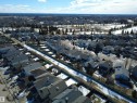 Aerial view of the neighborhood showcasing a collection of homes with various roof styles and surrounding trees - 21113 92A Avenue, Edmonton, AB  - Outdoor With View 