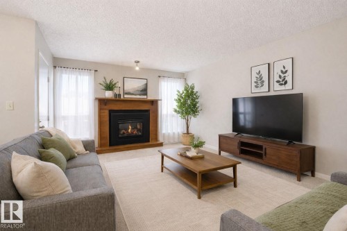53 1904 48 Street, Edmonton, AB - Indoor Photo Showing Living Room With Fireplace