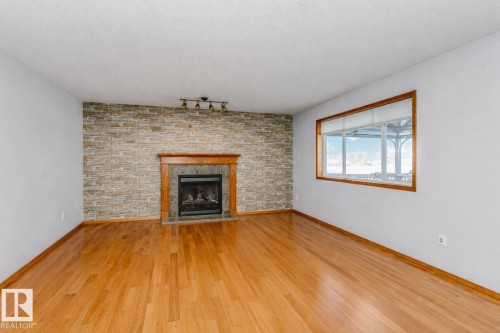37 Wedgewood, Fort Saskatchewan, AB - Indoor Photo Showing Living Room With Fireplace