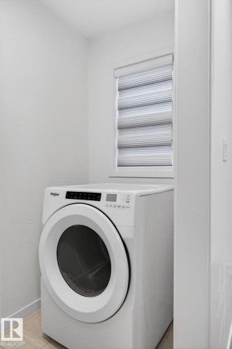 1091 Secord Promenade, Edmonton, AB - Indoor Photo Showing Laundry Room