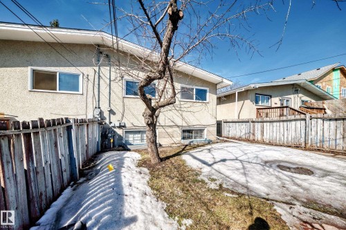 The property features an exterior with stucco siding and multiple windows - 12411 126 Street Nw, Edmonton, AB - Outdoor