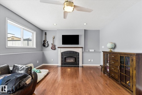 1064 Jones Crescent, Edmonton, AB - Indoor Photo Showing Living Room With Fireplace