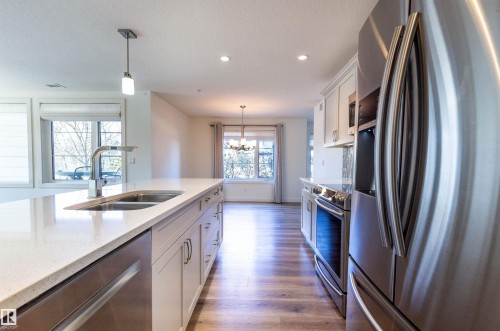 108 5025 Edgemont Boulevard, Edmonton, AB - Indoor Photo Showing Kitchen With Double Sink With Upgraded Kitchen