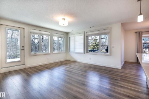 108 5025 Edgemont Boulevard, Edmonton, AB - Indoor Photo Showing Other Room