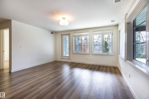 108 5025 Edgemont Boulevard, Edmonton, AB - Indoor Photo Showing Other Room