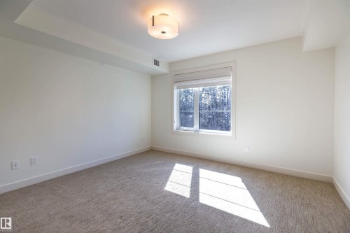 108 5025 Edgemont Boulevard, Edmonton, AB - Indoor Photo Showing Other Room
