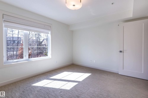 108 5025 Edgemont Boulevard, Edmonton, AB - Indoor Photo Showing Other Room