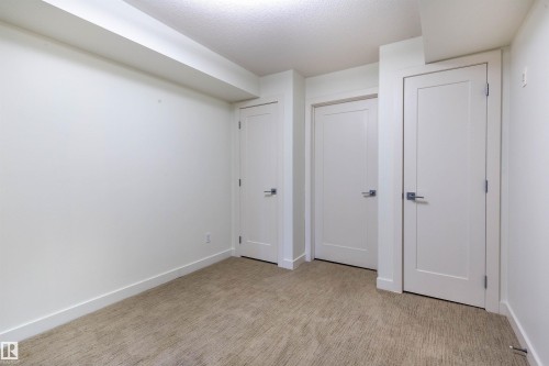 108 5025 Edgemont Boulevard, Edmonton, AB - Indoor Photo Showing Other Room