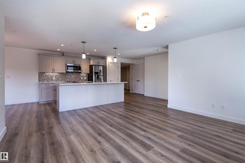 108 5025 Edgemont Boulevard, Edmonton, AB - Indoor Photo Showing Kitchen With Upgraded Kitchen