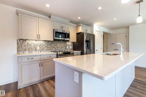 108 5025 Edgemont Boulevard, Edmonton, AB - Indoor Photo Showing Kitchen With Upgraded Kitchen