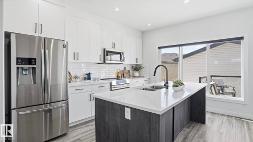 10 Meadowview Way, Leduc, AB - Indoor Photo Showing Kitchen With Stainless Steel Kitchen With Double Sink With Upgraded Kitchen