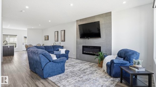 10 Meadowview Way, Leduc, AB - Indoor Photo Showing Living Room With Fireplace