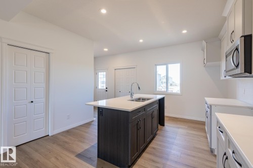 219 Wattle Road, Leduc, AB - Indoor Photo Showing Kitchen With Double Sink