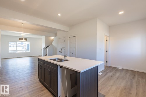 219 Wattle Road, Leduc, AB - Indoor Photo Showing Kitchen With Double Sink