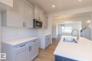219 Wattle Road, Leduc, AB  - Indoor Photo Showing Kitchen With Double Sink 
