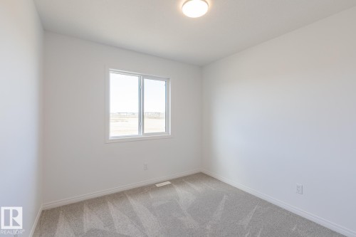 219 Wattle Road, Leduc, AB - Indoor Photo Showing Other Room