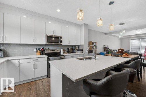 994 Berg Place, Leduc, AB - Indoor Photo Showing Kitchen With Double Sink With Upgraded Kitchen