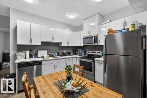 994 Berg Place, Leduc, AB - Indoor Photo Showing Kitchen With Stainless Steel Kitchen