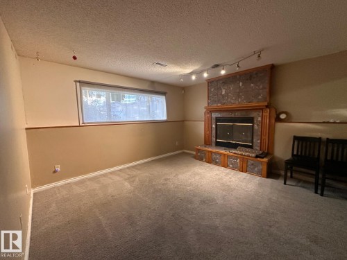 2807 35 Street, Edmonton, AB - Indoor With Fireplace