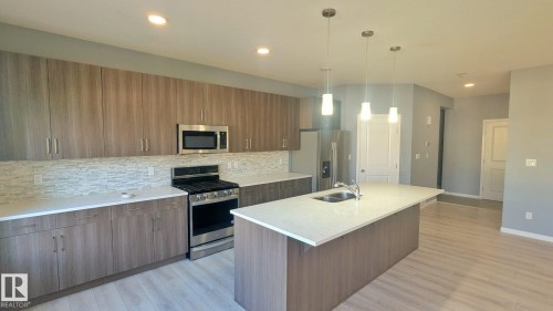 2318 Cassidy Way, Edmonton, AB - Indoor Photo Showing Kitchen With Double Sink