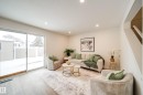Living area featuring recessed lighting, light-colored walls, and light-toned flooring - 125 Woodborough Way, Edmonton, AB  - Indoor Photo Showing Living Room 