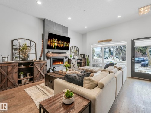 6720 105A Street, Edmonton, AB - Indoor Photo Showing Living Room With Fireplace