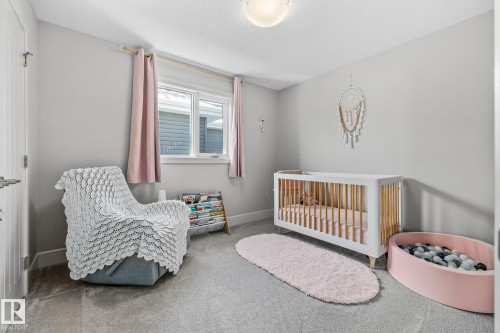 This room features light gray walls and plush gray carpeting - 3864 Robins Crescent, Edmonton, AB - Indoor Photo Showing Bedroom