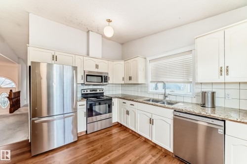 4714 26 Avenue, Edmonton, AB - Indoor Photo Showing Kitchen With Double Sink