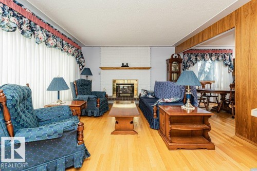 3528 112 Street, Edmonton, AB - Indoor Photo Showing Living Room With Fireplace