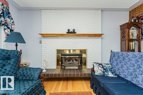 3528 112 Street, Edmonton, AB - Indoor Photo Showing Living Room With Fireplace