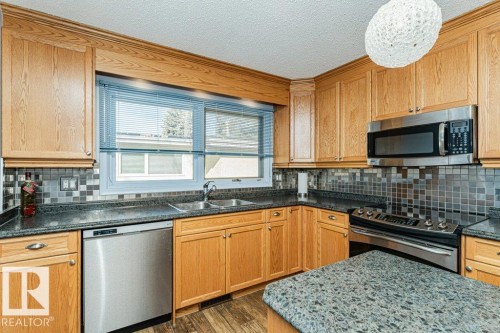 3528 112 Street, Edmonton, AB - Indoor Photo Showing Kitchen With Double Sink