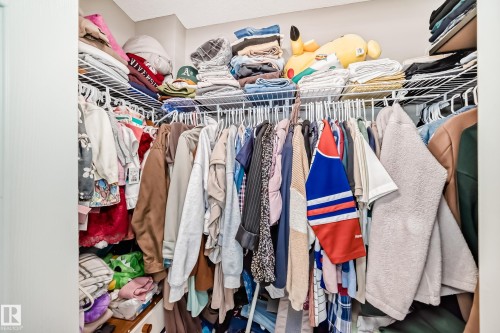 The property features a closet with wire shelving and hanging rods - 138 655 Tamarack Road Nw, Edmonton, AB - Indoor With Storage