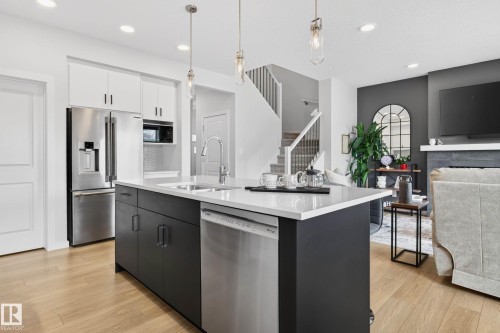 139 Stonehouse Way, Leduc, AB - Indoor Photo Showing Kitchen With Double Sink With Upgraded Kitchen
