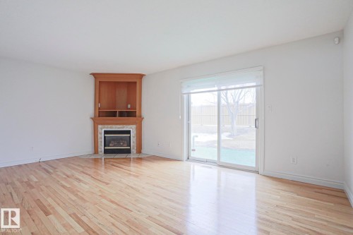 13 9505 176 Street, Edmonton, AB - Indoor Photo Showing Living Room With Fireplace