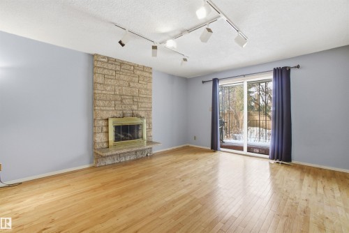 8616 179 Street, Edmonton, AB - Indoor Photo Showing Living Room With Fireplace
