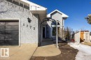 This property features a stucco exterior, an attached garage, and a concrete driveway - 3772 30 Street, Edmonton, AB  - Outdoor 