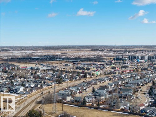 Expansive view of the surrounding neighborhood, featuring residential properties, commercial buildings, and open land - 3772 30 Street, Edmonton, AB - Outdoor With View