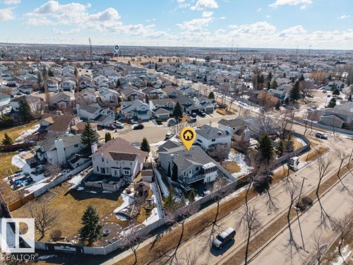 Aerial view of a residential neighborhood featuring homes with various roof colors and a clear sky above - 3772 30 Street, Edmonton, AB - Outdoor With View
