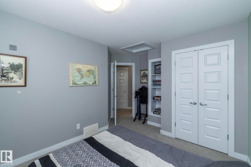This room features light grey walls and light colored carpeting - 7359 179 Avenue, Edmonton, AB - Indoor
