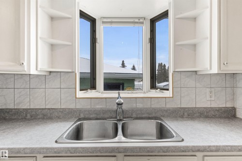 3211 70 Street, Edmonton, AB - Indoor Photo Showing Kitchen With Double Sink